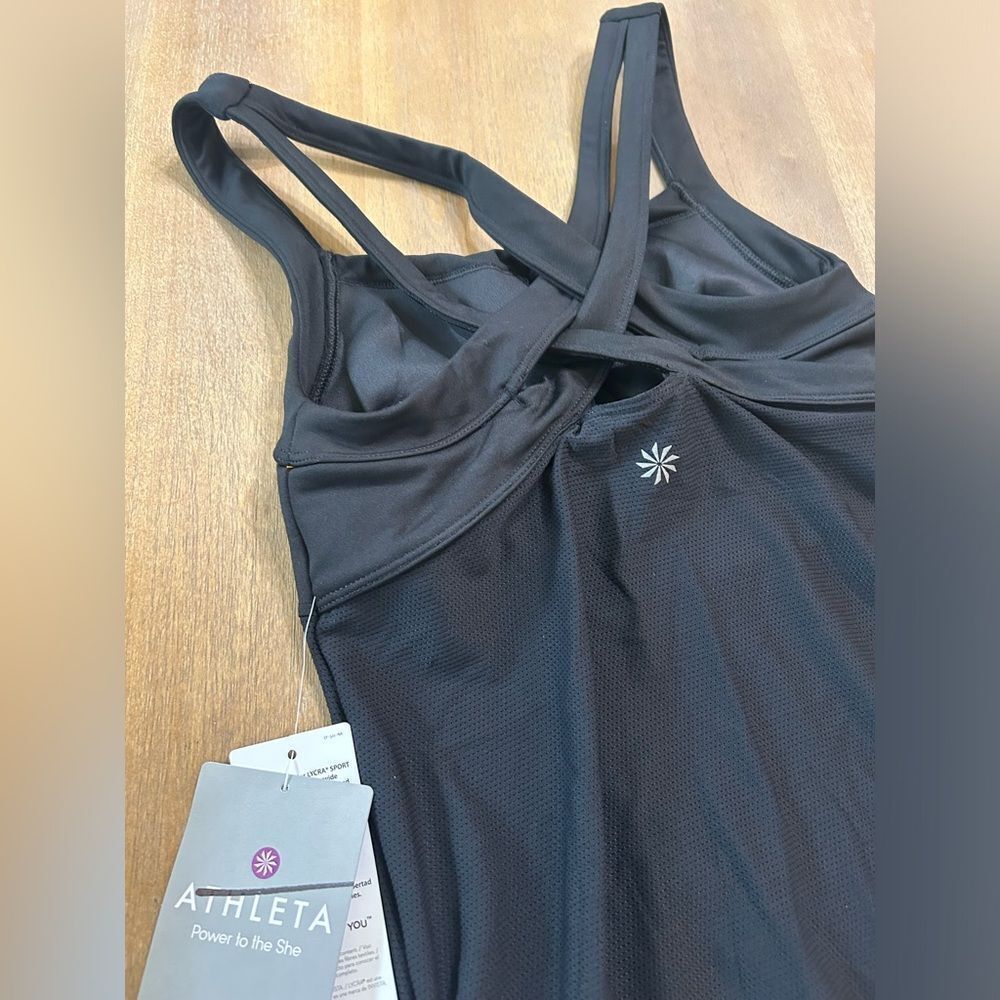 New with tags black Athelta workout top with criss cross back